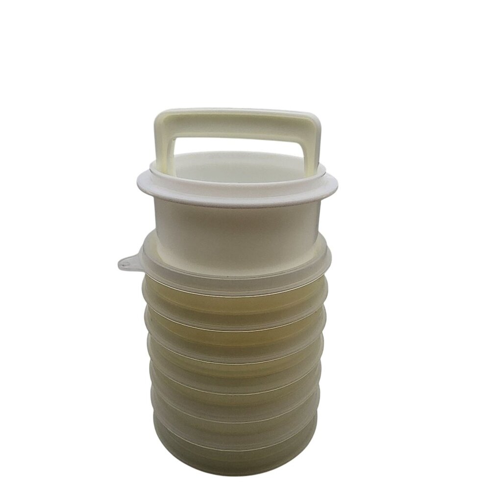 Vintage Tupperware Hamburger press with six storage containers